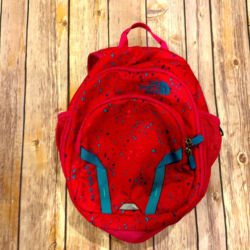 The north face child toddler sized backpack pink and blue